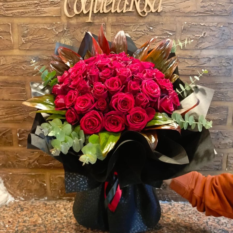Red rose bouquet with eucalyptus
