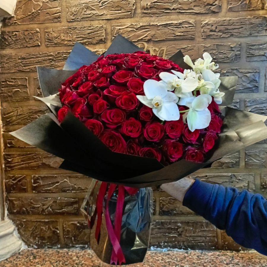 Red roses with white orchids